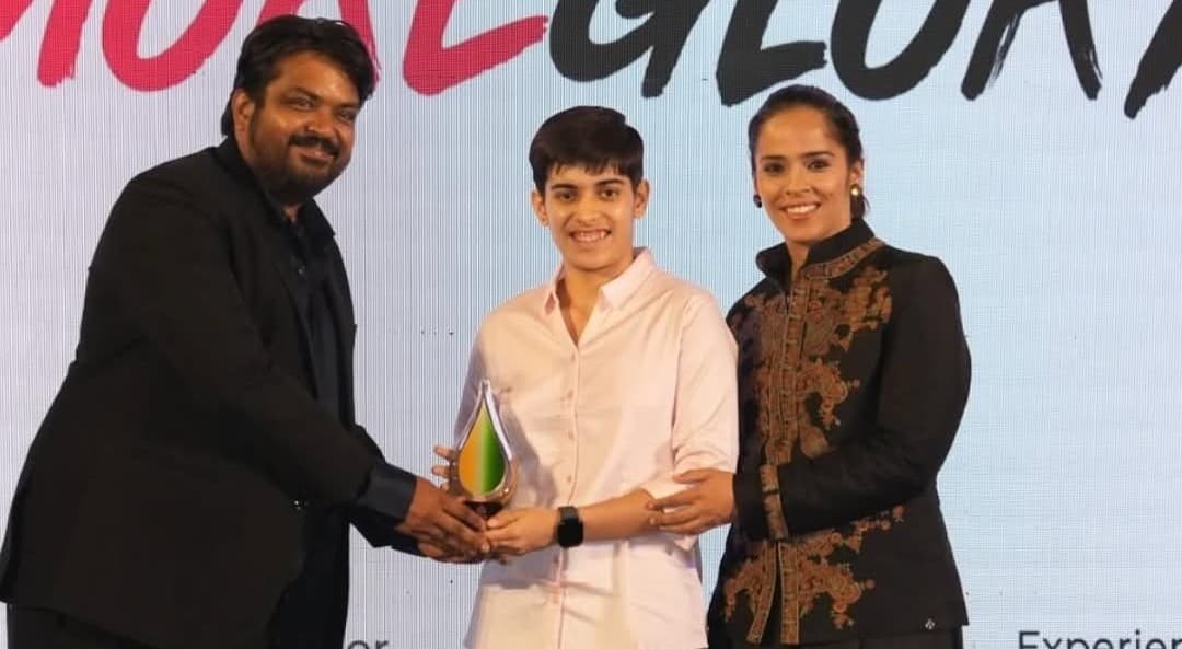 Anmol Kharb preparing to serve